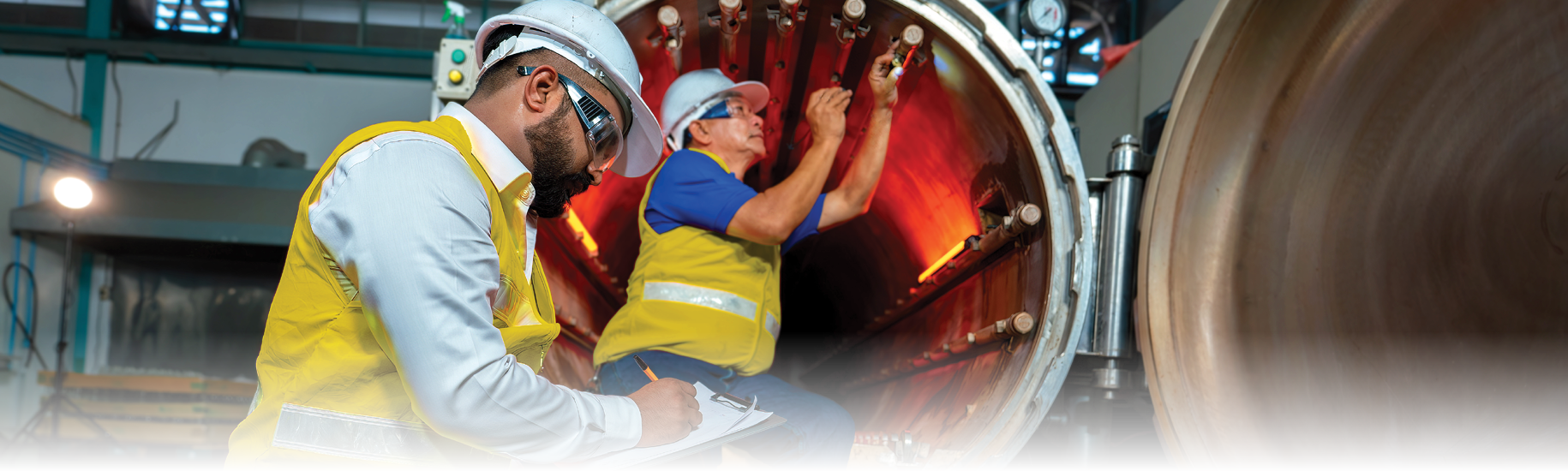 man inspecting nozzle
