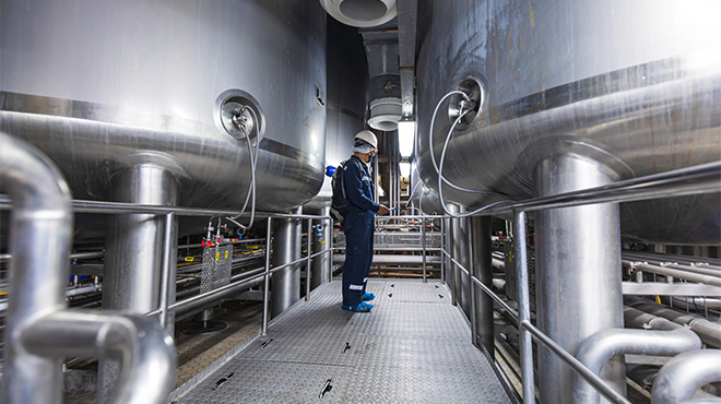 man standing in factory