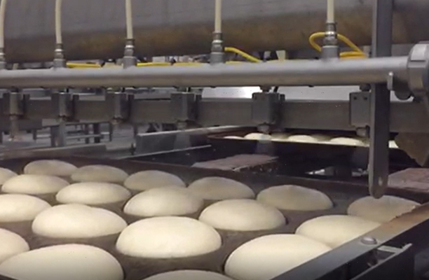 Spraying on bread dough