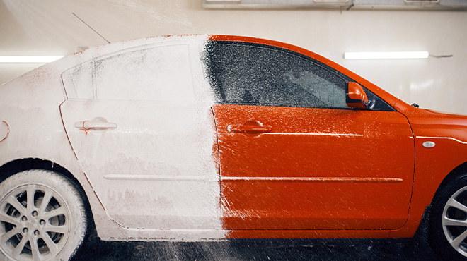 red car with soap on back end