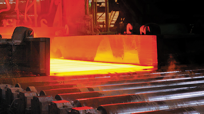red hot steel entering conveyor
