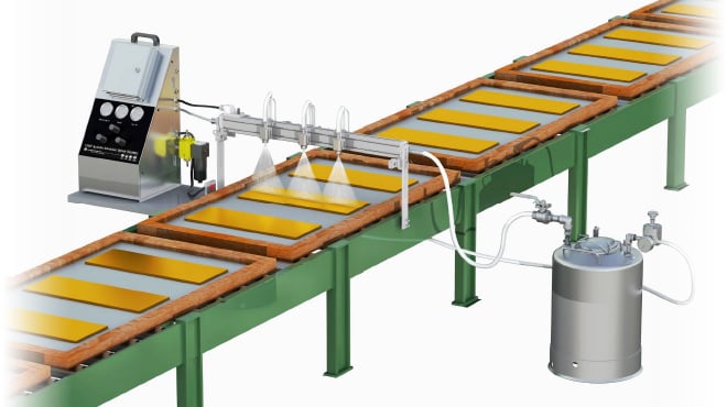 spray nozzles applying parting agent on bronze plaques