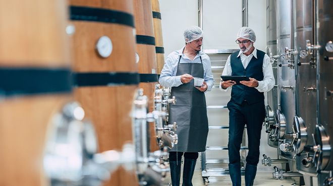 employees on a winery plant floor