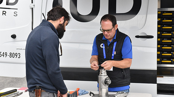 cloud-sellers employee assembling tank cleaning nozzle