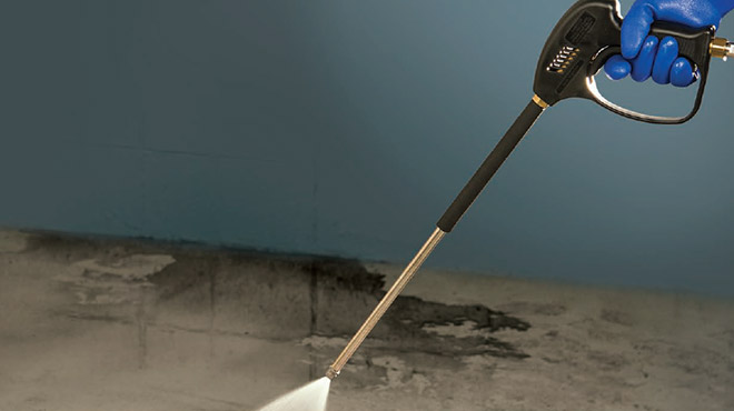 high pressure spray gun in use