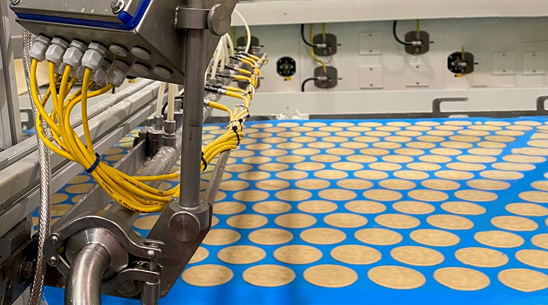 Milk spraying system