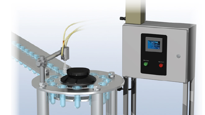 automated spray system for spraying into syringe barrels