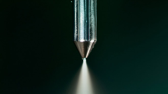 fluid bed processing nozzle spraying