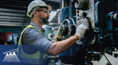 man in hard hat on shop floor