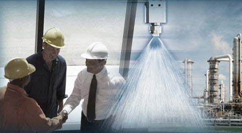 group of men and spray nozzle spraying