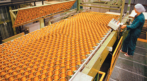 paint cans on a conveyor, coating application