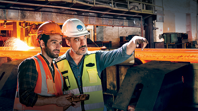 steel mill workers in hard hats