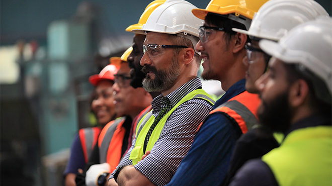 group of people in hard hats