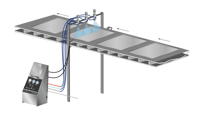 Spraying baking trays